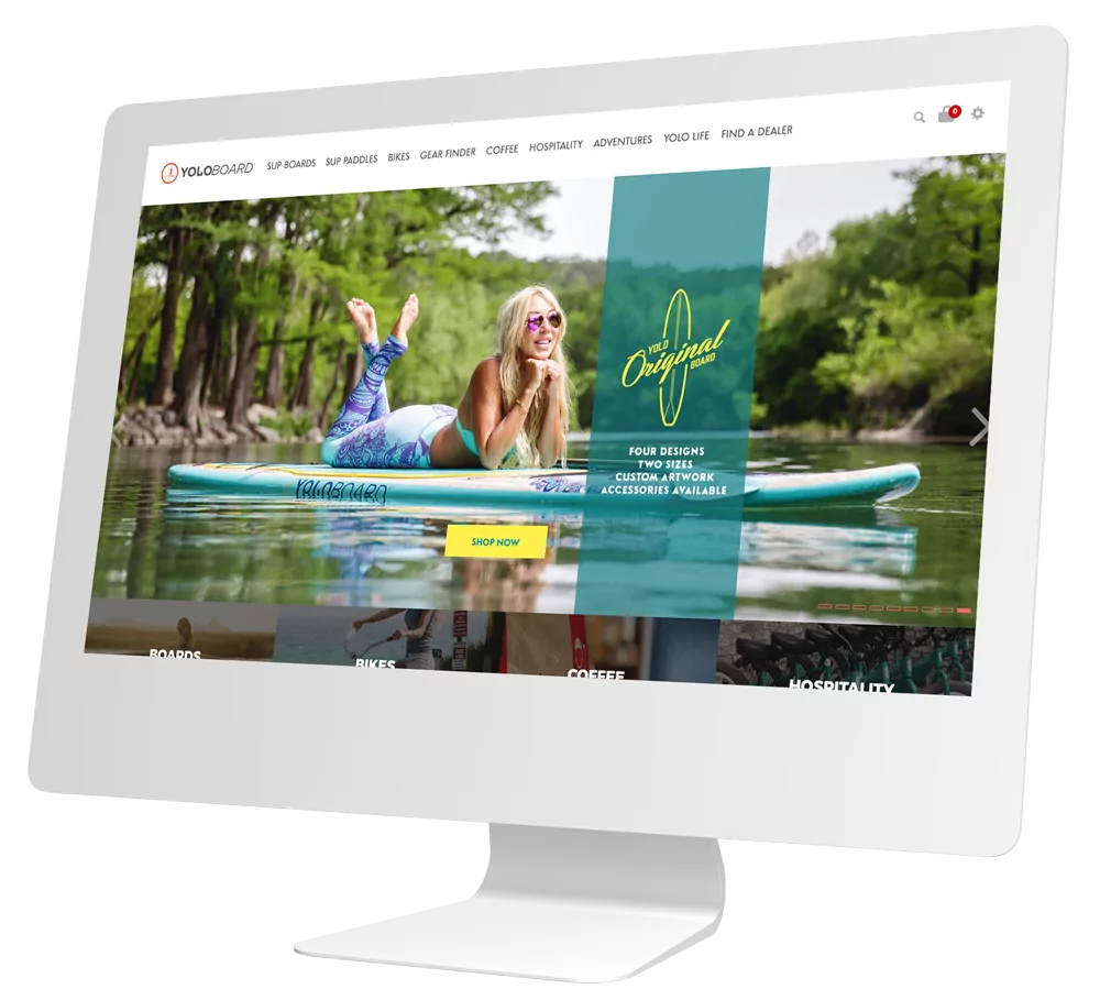 Imac screen with a website platform example developed by Living Proof Creative Agency