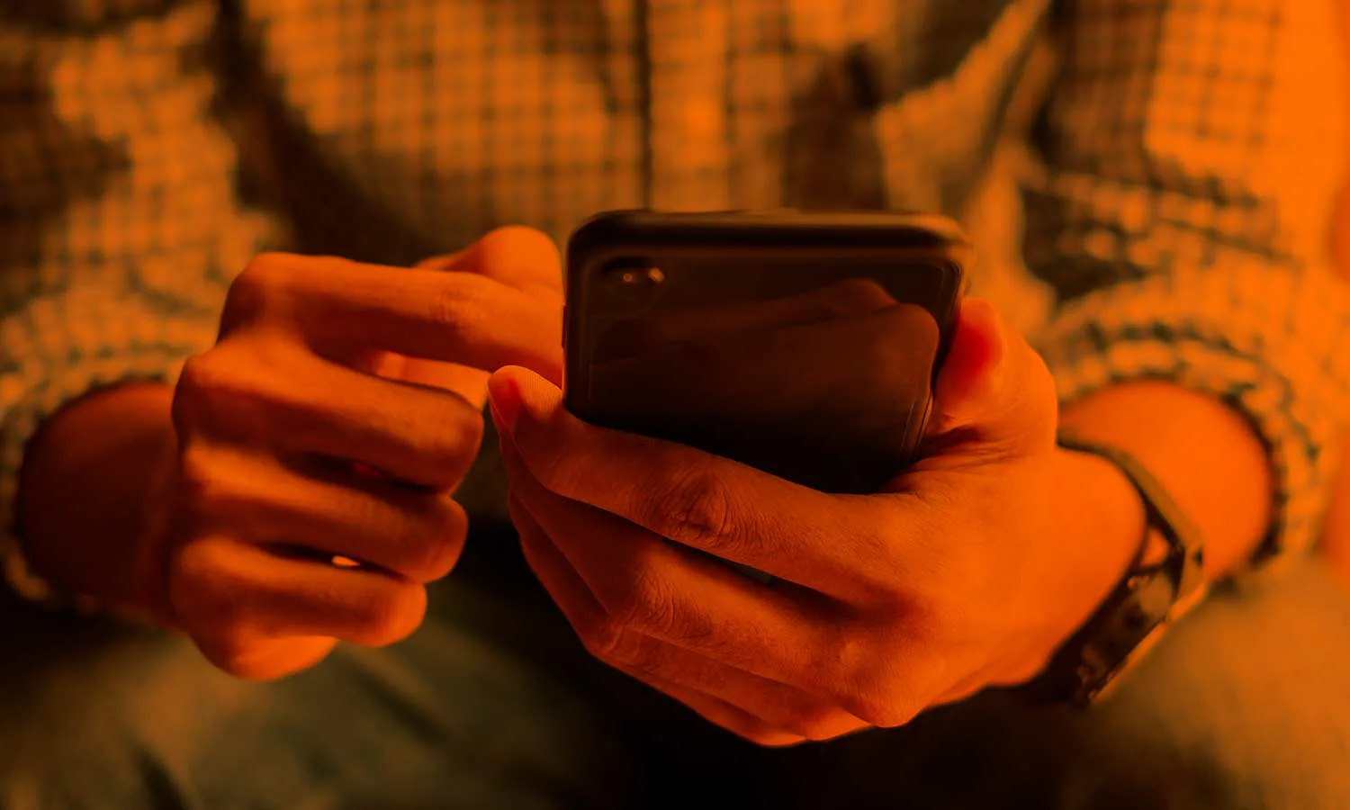 A man holding a mobile phone