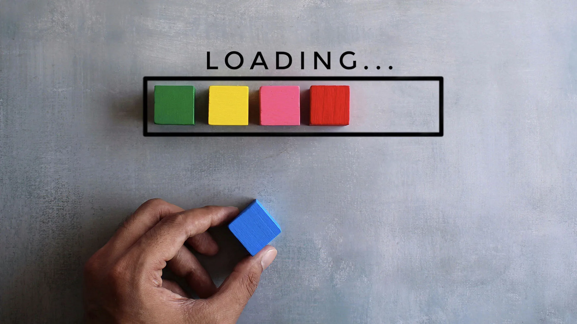 colorful blocks lined up below the word LOADING