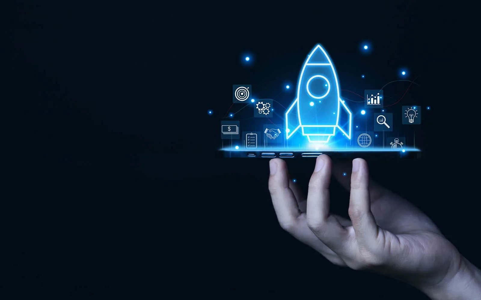 A futuristic rocket image being held by a human hand