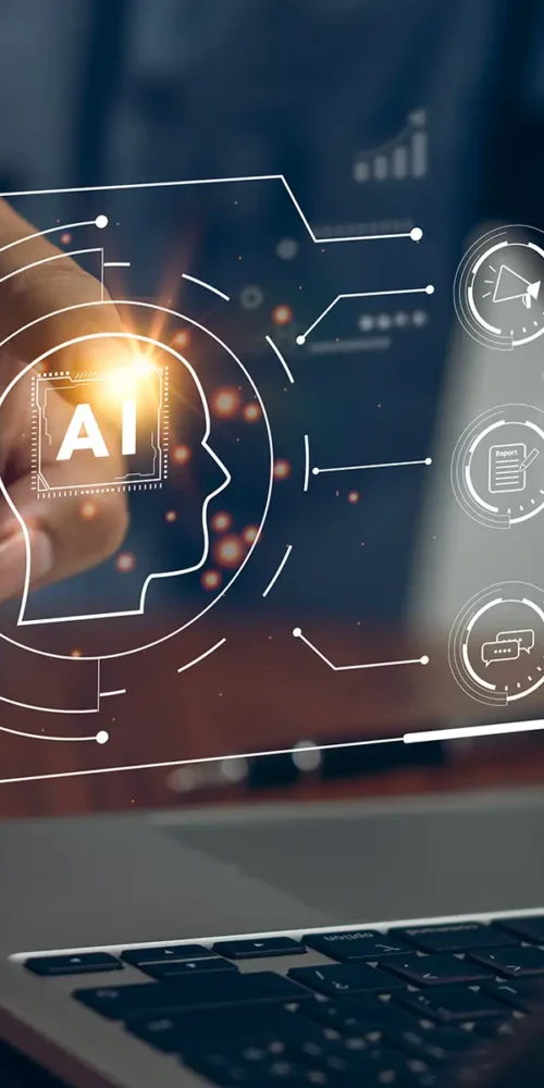 Man sitting in front of a laptop touching a virtual image of an eCommerce AI system floating over the keyboard